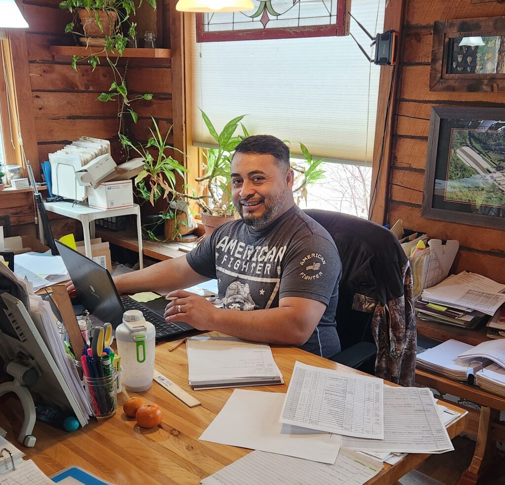 Rafael working at his desk